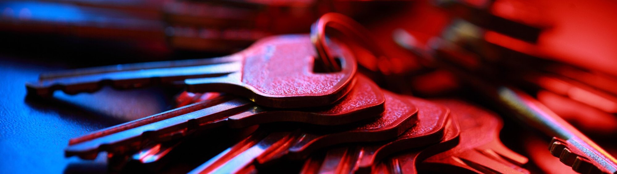 Keys on key ring with blue and red overlay